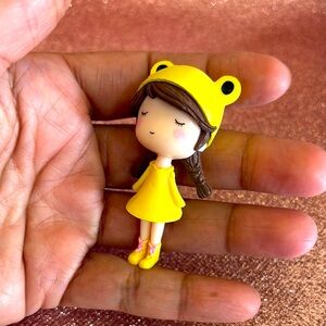 Cute 3D figurine Girl with yellow dress.